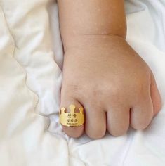 Custom Crown Gold Ring 24K 0.999 Pure 1g, 1.875g, 3.75g Here is a dainty, delicate and simple, Korean character personalized minimalist Gold Dol Crown Ring. The perfect gift for your little loved one 💕How to order  -Available in eight style designs can be personalized with your baby's name with birthdate   (Name can be in English) 1st design(첫돌)- A, B, C, D 100days design(백일) - A, B, C, D -Choose your weight for the ring (1g, 1.875g, 3.75g) -Please enter your baby's name and date in the persona Adjustable Gold Engraved Ring For Birthday, Adjustable Engraved Gold Ring For Birthday, Adjustable Gold Ring For Birthday, Gold Engraved Round Ring For Birthday, Adjustable Yellow Gold Birthday Ring, Gold Engraved Ring For Birthday, Gold Engraved Rings For Birthdays, Crown Gold Ring, Korean Characters