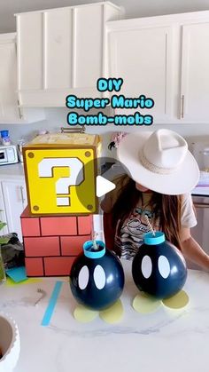 Trish 💕 Beautiful Lifestyle Blogger on Instagram: "DIY Super Mario Bomb-omb’s 💣 ⭐️ Comment “bomb” for the links! I thought it would be fun to create a 3D birthday backdrop for my Husband’s birthday 🥳 And when I saw these little bombs, I knew I had to make them! I used black balloons  Card stock paper, tape, and rope! I thought they turned out so cute! And they’re super easy to make! Tag me if you make your own! I’d love to see them! 😃 💣⭐️  . . #supermario #mario #mariobros #supermariobros #bomb #diy #diycrafts #diyhomedecor #diyprojects #diycraft #diyproject #diyparty #diypartydecor #party #partydecorations #partydecor #partyideas #partydecorations #partytime #partyinspiration #partyballoons #balloons #partyplanner #partydetails #partydecoration #partyplanning #makeitwithmichaels #hob Mario Kart Power Ups, Mario Banana Peel Diy, Super Mario Brothers Diy Decorations, Super Mario Backdrop With Balloons, Diy Super Mario Backdrop, Mario Birthday Party Dollar Tree, Mario Backdrop Birthday Party Ideas, Diy Mario Banana Peel, Mario Party Themed Food