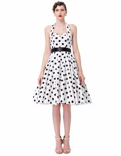 This vintage-inspired polka dot dress is retro fashion at its finest. Featuring a halter top an A-Line design with a swing skirt and a belted waist this dress is a classic that will always be fashionable. Made with a polyester & cotton blend and comes in 7 fun color patterns. 1950s Style A-line Polka Dot Dress, Spring Polka Dot Vintage Dress, 1950s Style Polka Dot Dresses For Spring, Fitted Retro Summer Halter Dress, Retro Belted Dresses, Fitted Retro Halter Dress For Summer, Summer Polka Dot Pinup Dress, Polka Dot Pinup Dress For Summer, Summer Pinup Polka Dot Dress