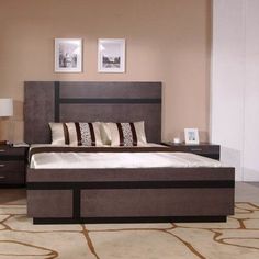 a bedroom with a bed, dresser and night stand