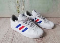 Vintage 90s ADIDAS White Sneakers Sneaker low shoes 3 stripe mod design Easy to put on. Leather upper Spring/ Fall ADIDAS Made in Indonesia Leather Size on tag: US 3.5 UK 3EU 35.5 Condition: Used vintage condition! Item has signs of wearing. Measurements: Outsole - 25.5 cm / 10'' in ☆ SHIP WORLDWIDE ☆ I ship from Latvia EU worldwide. Estimated delivery time to: European Union 5 - 7 Business days; USA 2 - 3 weeks; Worldwide 3 - 5 weeks. Thank you for checking in and let me know if you have any qu Vintage Style Sneakers With Three Stripes For Sports, Adidas Low-top Sneakers With Three Stripes, Fall Adidas, Adidas Low-top Three Stripes Sneakers, Vintage Sports Sneakers With Three Stripes, Athletic Tennis Shoes, Adidas Lace-up Sneakers With Three Stripes Branding, 90s Adidas, Adidas White Sneakers