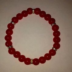 Handmade Beaded Bracelets Designed By A Young Entrepreneur Named Maya Small Glass Bead Bracelet Ideas, Red Bead Bracelet Ideas, Bracelet Ideas Glass Beads, Glass Beaded Bracelets Ideas, Red Bracelet Ideas, Pulseras Aesthetic, Burgundy Bracelet, Bracelet Business, Bracelet Colors