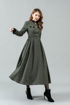 ★★ Welcome to my Ylistyle shop！！！ Snuggle up in style this winter with our distinctive Army Green Wool Dress. This dress has the style of a military dress with a button front. This winter, make a statement with our green dress.  ★★FEATURES 25% wool, other fiber,nylon Polyester lining Two side pockets Back hidden zipper closure Long sleeve wool dress Button front wool dress A Line dress Fit and flared dress Military dress Perfect for winter, autumn Dry clean ★★Mode size Height 170 cm (5′ 6″) Bust  90 cm (35")  Waist 70 cm (27") She wears size S. ★★ Custom order selecttion Request other color Request Change the Length Request Change the sleeve length Your height is not between 155cm- 175cm Your weight is not between 47kg -77kg ★★ Get your size in Size Chart with your body measurement https:/ Chamois Dress, Winter Wool Dress, Military Dress, Military Dresses, Army Green Dress, Deco Salon, Body Measurement, Handmade Dress, Dress Handmade