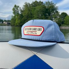 Expertly crafted: SLL PATCH SKY BLUE ROPE HAT is a durable and comfortable cotton/poly blend with a plastic snapback for an adjustable fit. With UPF 50+ and water repellent properties, this hat protects from the sun and water while showcasing the OG SLL PATCH design.   * Cotton/Poly Blend *  Plastic Snapback * UPF 50+ * Water Repellent Cotton Snapback Hat With Flat Bill For Camping, Cotton Flat Brim Hats For Camping, Flat Brim Cotton Hat For Camping, Cotton Flat Bill Hat For Outdoor Activities, Summer Camping Hats With Flat Bill, Blue Cap-shaped Sun Hat For Outdoor, Summer Camping Hat With Flat Bill, Casual Light Blue Hat For Outdoor, Casual Light Blue Outdoor Hats