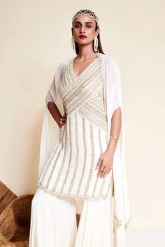 Shop for Reeti Arneja Ivory Georgette Indu Panel Embroidered Kurta Sharara Set for Women Online at Aza Fashions Reeti Arneja, Kurta Sharara Set, Kurta Sharara, Embroidered Hem, Head Gear, Embroidered Bodice, Embroidered Border, Sharara Set, Pattern Embroidery