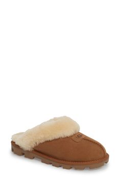 Genuine shearling lining creates superior softness and warmth in this comfy, cozy slipper. Wear it barefoot for maximum benefit; genuine sheepskin helps keep feet dry and comfortable in cold temperatures. The sturdy sole on ensures durability and makes the style ideal for indoor and outdoor wear. Style Name:UGG Genuine Shearling Slipper (Women). Style Number: 127311. Classic Indoor Slippers, Soft Brown Slip-on Slippers, Brown Soft Slip-on Slippers, Soft Casual Sheepskin Slippers, Brown Plush Lined Indoor Slippers, Brown Plush Lined Slippers For Indoor, Classic Sheepskin Slippers For Winter, Cozy Brown Shearling Slippers, Classic Shearling Slippers For Winter