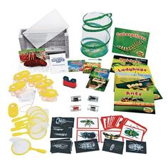 an assortment of items that include sunglasses, cards, and other items to make a science experiment