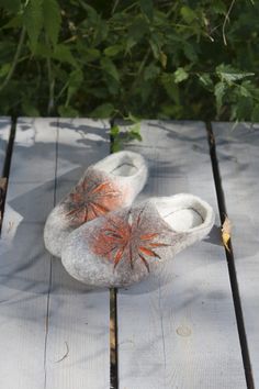 Felted slippers in grey and brown and orange. These cute slippers are bestsellers of all the time at JurgaFeltLife shop just in other, orange coloration. We call them Sand Sun Flowers. They are made of natural, organic wool with a little bit of colored wool. These natural woolen clogs are made by hand, using an ancient technique. Colors of slippers: grey, brown, tan, white smoke, ivory. Felt is a perfect material for footwear. It is extremely wear-proof and warm. When you put them on, you won't Orange Round Toe Clogs With Rubber Sole, Gray Non-slip Closed Toe Slippers, Orange Slip-on Casual Slippers, Casual Orange Slip-on Slippers, Orange Non-slip Casual Slippers, Gray Closed Toe Slippers With Rubber Sole, Sunburst Pattern, Sun Flowers, Cute Slippers