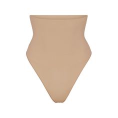 Get ultimate compression with our highest support level in this high-rise shapewear thong that sculpts, smooths, and tones your core and tummy. Wear this silky staple under everything to enhance your natural shape. Features removable adjustable straps. | SKIMS High-Waisted Thong | Medium Neutral | Core Control Beige No-show Soft Touch Shapewear, Beige No-show Shapewear With Soft Touch, High-cut Leg Shapewear With Built-in Bra, Beige Full Coverage Shapewear With Soft Touch, Beige Smoothing Sculpting Shapewear, Beige Sculpting Smoothing Shapewear, Solid Full Coverage Second-skin Shapewear, Full Coverage Second-skin Shapewear, Compressive Beige Shapewear