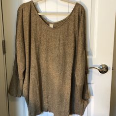 This Retreat Waffle Knit Top Shirt Is Perfect For Any Season! With A Comfortable Round Neck And Pullover Closure, It's Easy To Wear And Style. The Long Sleeves Make It Great For Cooler Weather, While The Lightweight Knit Fabric Also Makes It Suitable For Summer. The Brown Color Complements Any Wardrobe, And The Polyester, Spandex, And Rayon Blend Ensures A Comfortable Fit. It's Available In Plus Size 3xl And Is Brand New Without Tags. Add This Basic Style To Your Collection Today! Oversized Textured Knit Brown Tops, Oversized Brown Textured Knit Top, Oversized Brown Soft Knit Tops, Women's Retreat, Womens Retreat, Color Complement, Waffle Knit Top, Cooler Weather, Lightweight Knit