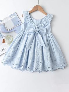 Light Blue Eyelet Ruffle Dress | Girls Summer Dress – i-diya Blue Eyelet Dress For Summer, Summer Blue Dress With Bow Straps, Summer Blue Dresses With Bow Straps, Blue Eyelet Summer Dress, Light Blue Summer Dress With Bow, Blue Sleeveless Dress With Bow Straps, Cute Cotton Dress With Bow Tie Back, Light Blue Sleeveless Dress With Bow, Spring Dress With Bow Straps For Dress-up Occasions