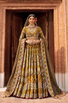 Buy Pakistani Bridal Choli with Mustard Lehenga in premium quality Raw silk. Motifs, crystals, gota, and zari make this Lehenga Choli an epitome of beauty. Mnr Bridal Dress, Mustard Lehenga, Bridal Choli, Matching Lehenga, Jaal Dupatta, Mehndi Bridal, Sajjal Ali, Pakistani Bridal Dress, Raw Silk Fabric