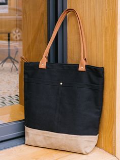 Overview： Design: Women Canvas Shopper Tote Bags Canvas Tote Shoulder Bag Handbag for MensIn Stock: Ready to Ship (2-4 days)Include: Only BagCustom: NoColor: Black&Khaki Leather: CanvasMeasures: 40cm x 39cm x 13cm Weight: 0.45kgSlots: 1 zipper slot, 1 phone slot, 1 wallet slot, Accessories(option): NoneStyle: Women Canvas Shopper Tote Bags Canvas Tote Shoulder Bag Handbag for MensVery durable (At least 5 Years) and it should last a life time Description: Upgrade your everyday must-haves with the enduring sophistication of our Black & Khaki Canvas Tote Bag. Designed with meticulous care, this adaptable piece effortlessly shifts from errands to the office to globetrotting, all with timeless grace. Sized at 40cm x 39cm x 13cm, this capacious tote offers generous space for your daily essential Felt Hair Accessories, Overview Design, Felt Necklace, Leather Diy Crafts, Felt Bag, Shopper Tote, Black Khakis, Leather Diy, Life Time