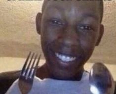 a man holding a fork and knife in front of his face with the caption, what do you mean?