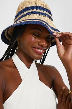 At the heart of STAUD is design. Think attention to detail, opposition to the ordinary, and a feminine aura. A blend of originality and style make this a cult-favorite brand of fashionistas and celebrities.Embrace effortless summer style with the Natural and Navy Raffia Bucket Hat. Crafted from lightweight raffia, this versatile accessory features a wide brim perfect for shielding your face from the sun. Ideal for beach days or casual outings, pair it with a flowy sundress or your favorite short Raffia Bucket Hat, Feminine Aura, Flowy Sundress, Summer Style Guide, Cocktail Attire, Weekend Wear, Hats For Sale, Beach Days, Hat Shop