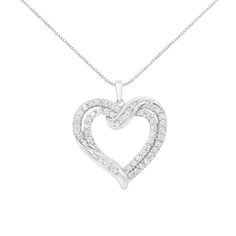 Delicate and elegant, this sterling silver heart pendant features 1.00 cttw of diamonds. Cool sterling silver ribbons studded with glittering round cut diamonds intertwine and create a flowing double heart cutout. The metal is genuine .925 sterling silver, a metal that will shine and stay tarnish free for years to come! The diamonds are round-cut and have a beautiful I2-I3 clarity. The pendant hangs from a box chain that secures with a spring ring. This is the perfect accessory for any occasion! Double Heart Necklace, Sterling Silver Heart Pendant, Silver Heart Pendant, Double Heart, Matching Bracelets, Sterling Silver Heart, Box Chain, Round Cut Diamond, Silver Heart