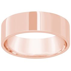 a rose gold wedding ring on a white background