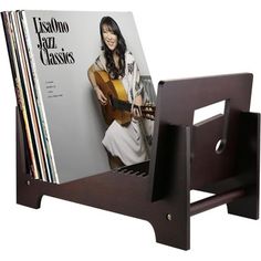 a magazine rack with a guitar on it