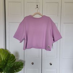 Oversized Short Sleeve Crop Sweatshirt 18.5" Length 28" Pit To Pit Listed As An Xl Brand Lee New With Tags Color Sugar Lilac Oversized Purple Tops For Streetwear, Lavender Relaxed Fit Tops For Loungewear, Purple Oversized Short Sleeve Top, Oversized Purple Loungewear Top, Oversized Purple Lounge Top, Oversized Long Sleeve Lavender Top, Oversized Lavender Cotton Top, Oversized Purple Top For Loungewear, Lavender Relaxed Fit Crew Neck Top