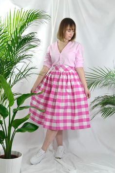 Magenta /cerise pink and white check high waist full gathered skirt. Perfect for casual outfits and special ocasions with pair of trainters or high heels. 100% cotton.  Elastic at the back of waist.  Two side pockets. Midi lenght about 70cm + 5 cm waistband. Handmade in UK.  Model wears size S.  HOW TO CHOOSE A SIZE ?   Using a measuring tape, measure the smallest part of your waist.  SIZE CHART: (CM) XS - W: 66 CM S - W: 70 CM M - W: 74 CM  L - W: 78 CM  XL - W: 82 CM  CARE INSTRUCTIONS: Hand w Pink Gathered Skirt Dress For Spring, Pink Spring Dress With Gathered Skirt, Spring Pink Dress With Gathered Skirt, Pink Dress With Gathered Skirt For Spring, Gingham Tiered Skirt With Lining, Casual Gingham Gathered Skirt, Spring Gingham Gathered Skirt Bottoms, Gingham Gathered Skirt Bottoms For Spring, Gingham Gathered Skirt For Spring