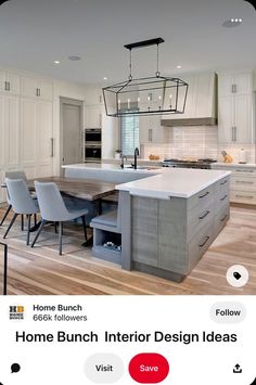 a kitchen with an island and chairs in it