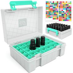 an open plastic tool box filled with lots of black and teal colored bottles next to a set of markers