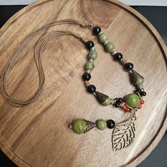 Women's Adjustable Cord Necklace Green Ceramic Beads Long Necklace Boho New Without Tags, Unbranded Sweater Necklace Fall Winter Boho Bohemian Hippie Unique Long Necklace Beaded Festival Great Gift Idea For Birthday Valentine's Day Christmas Anniversary Any Day Statement Jewelry Fashion Jewelry Costume Jewelry For Everyday Colors: Tan Cord That Adjusts Length, Green Ceramic Beads, Leaf Pendant, Metal Pieces 22+ Inches In Length,Adjustable Inv# A196 **All Items Come From A Smoke Free Home** Trust Nature Core, Beads Long Necklace, Boho Beaded Necklace, Autumn Jewelry, Long Necklace Boho, Autumn Necklace, Sweater Necklace, Winter Boho, Necklace Green