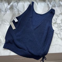 Nwt Navy Sweater Tank From Aritzia With Open Back Detail! Super Cute, Perfect For Summer! Blue Sleeveless Knit Sweater, Navy Fitted Knitted Top, Fitted Sleeveless Blue Sweater, Fitted Soft Knit Blue Top, Fitted Blue Soft Knit Top, Blue Knit Sweater Vest, Fitted Blue Knitted Sweater Vest, Fitted Knit Sweater Vest In Blue, Blue Knitted V-neck Top