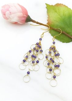 Gold Amethyst Drop Earrings Mother's Day Gift Handmade Purple Amethyst Chandelier Earrings, Purple Chandelier Earrings With Ear Wire As A Gift, Purple Amethyst Earrings With Dangling Beads, Nickel-free Purple Dangle Chandelier Earrings, Nickel-free Purple Chandelier Earrings Gift, Purple Gemstone Chandelier Drop Earrings, Purple Wire Wrapped Chandelier Drop Earrings, Purple Gemstone Chandelier Earrings, Elegant Purple Crystal Earrings With Dangling Beads