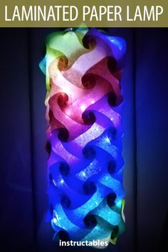 an illuminated paper lamp in the dark with text overlay that reads, how to make lighted paper lamps