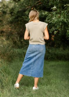 Let us introduce you to the denim skirt you'll want to wear with everything, the Lee A-Line Raw Hem Midi Skirt! This stunning midi denim skirt is an Inherit Design made in the USA! Crafted from high quality, stretchy, medium wash denim that is super soft and will keep you comfortable all day long. The A-line fit is walkable, modest, and on-trend with a raw hem. This sustainable, modest, American-crafted skirt is a true seasonless staple you will wear for years to come! Style | Midi, Denim Color Dark Wash Denim Midi Skirt For Spring, Spring Medium Wash Denim Midi Skirt, Casual Medium Wash Midi Skirt, Casual Denim Midi Skirt, Casual Dark Wash Midi Denim Skirt, Casual Medium Wash Denim Midi Skirt, Fall Denim Midi Skirt, Knee-length Medium Wash Skirt For Fall, Relaxed Dark Wash Denim Midi Skirt