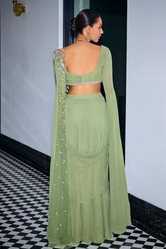 Sage green pre-stitched saree with sequin, cutdana embroidery in floral placement pattern. Paired with ruched pleated blouse. - Aza Fashions Fitted Sets With Draped Sleeves For Wedding, Fitted Wedding Sets With Draped Sleeves, Fitted Blouse With Draped Sleeves For Festive Occasions, Festive Fitted Sets With Draped Sleeves, Fitted Saree Blouse With Draped Sleeves, Fitted Draped Georgette Blouse, Fitted Blouse With Draped Sleeves For Saree, Fitted Pista Green Blouse For Reception, Fitted Tops With Traditional Drape For Reception