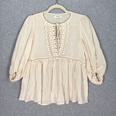 Max Studio Top Womens Xs Cream Blouse Crochet Cottage Fairy Cowgirl Coastal Tie Beach Vacation Resort Coastal Western Cowgirl Rodeo 3/4 Sleeve Balloon Puff Peplum Pleated Flowy $98 Msrp New With Tag Sku 4558 **Please See All Pictures For Full Item Condition, Details, And Approximate Measurements** - Ships Same/Next Day, Professional Seller, Offers Welcome, Like Or Watch For Price Drops - Item In Photos Is Exact Item You Will Receive - I List New Items Daily, Be Sure To Browse My Store/Closet For Cream Long Sleeve Lace Top For Summer, Beige Long Sleeve Lace Top For Summer, Summer Peasant Top With 3/4 Sleeves, Peasant Style 3/4 Sleeve Summer Top, Peasant Style 3/4 Sleeve Top For Summer, Spring Long Sleeve Blouse With Crochet Trim, Bohemian Cream Blouse With 3/4 Sleeves, Spring Crochet Trim Long Sleeve Blouse, Spring Peasant Top With 3/4 Sleeves