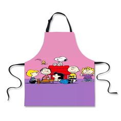 a pink apron with the image of peanuts and friends on it, all in front of a purple background