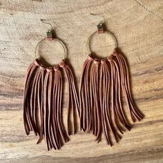 "Gorgeous tassel earrings in silky soft deer lace and sterling silver. Drop from top of earring to bottom is 6\". These have 5 knotted tassels instead of 7, so there's a little less width - for those who like the look but prefer less under the ear! These are hand-cut and knotted with the softest deer leather lace I could find. Every detail was considered - even the deer lace loops attaching the hammered bronze hoops to the ear wires. There simply is no better. These are way better than stiff lea Rustic Cross, Deer Hide, Cotton Necklace, Country Chic Wedding, Bronze Earrings, Bridal Party Gifts, Great Christmas Gifts, Leather Lace, Chic Wedding