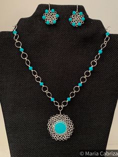 A beautiful and exclusive set with necklace and earrings, the set is wire wrapped and the beads hand crimped, using beautiful hand painted glass bead and some glass beads. Something to highlight: the pendant is a turquoise howlite set in crochet, using the exclusive Peruvian stitch  The set is made with high quality glass beads and professional wire. Every single chain and charm is handmade, even the clasps. The necklace measures approx. 42 cm. An elegant timeless accessory for any occasion. * T Handmade Turquoise Bohemian Jewelry Sets, Handmade Bohemian Turquoise Jewelry Sets, Handmade Bohemian Silver-plated Wire Jewelry, Handmade Bohemian Silver Plated Wire Jewelry, Turquoise Wire Wrapped Round Jewelry, Nickel-free Turquoise Jewelry In Silver-plated Wire, Nickel-free Turquoise Silver-plated Wire Jewelry, Bohemian Silver Plated Nickel-free Jewelry, Nickel-free Turquoise Silver-plated Jewelry