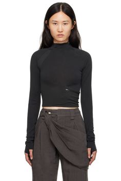 Hyein Seo: Black Pocket Long Sleeve T-Shirt | SSENSE Athleisure Stretch Turtleneck Tops, Athleisure High Neck Tops With Thumbholes, Casual High Stretch Turtleneck With Thumbholes, Sporty Stretch Top With Funnel Neck, Stretch Mock Neck Top For Layering, High Neck Athleisure Top, Fitted Turtleneck Athleisure Top, Fitted Funnel Neck Athleisure Top, Sporty High-neck Top With High Stretch