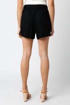 Upgrade your summer wardrobe with our Black Aretha Shorts. Made with an elastic waist for a comfortable fit and convenient pockets, these shorts are perfect for all-day wear. Stay stylish and functional with our Aretha Shorts. Fabric & fit: model is wearing size small. Relaxed Fit Bottoms With Built-in Shorts For Summer, Versatile High-waisted Shorts With Elastic Waistband, Black Relaxed Fit Summer Shorts, Vacation Bottoms With Built-in Shorts, Versatile Relaxed Fit Shorts For Day Out, Versatile Short Bottoms For Day Out, Versatile High-waisted Shorts For Day Out, Versatile Short Length Bottoms For Day Out, Versatile High-waisted Shorts For Summer