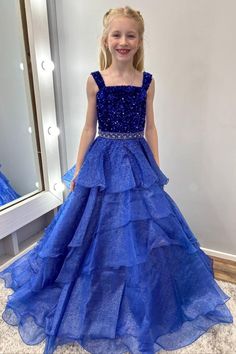 "Dazzle on stage with this Royal Blue Sequin Beaded Multi-Layer Ruffle Girl Pageant Gown! Featuring a eye-catching sequined top and beaded, multi-layered ruffle skirt, this long gown is perfect for pageants. With delicate straps for comfort and a stunning design, this gown will make any girl feel like a winner!"#wedding#flowergirldresses#girlpartydresses#girlbirthdaydresses#girlpageantdress Pageant Gown, Sequined Top, Long Gown, Ruffle Skirt, On Stage, Feel Like, Royal Blue, Sequin, Blue