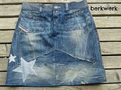 a skirt made out of old jeans with stars painted on the front and back side