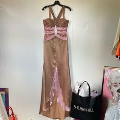 Sherri Hill Brand Size 8 Like New Condition No Retail Sales Tag Does Have Sherri Hill Brand Fabric Tag With Size ( See Pics ) Pink & Caramel Color Tones Tons Of Rhinestones & Exquisite Beadwork Throughout Long Extended Train At Back Back Zip Up Encloser & Upper Back 3 Hook & Eye Enclosures Any Questions Please Feel Free To Ask Beige Fitted Satin Maxi Dress, Fitted Beige Satin Maxi Dress, Beige Fitted Dress With Sweep Train, Fitted Beige Dress With Sweep Train, Fitted Beige Dresses With Sweep Train, Formal Brown Satin Maxi Dress, Brown Satin Maxi Length Dress, Beige Gown For Evening Dress, Beige Evening Dress With Sweep Train