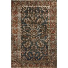 an antique rug with blue and red colors