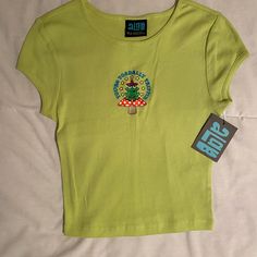 Brand New With Tags! Perfect Condition, Never Worn Before Super Cute Just Not My Style Green Y2k Graphic Print Tops, Y2k Green Graphic Print Tops, Green Graphic Print Y2k Tops, Retro Green Cotton Top, Retro Fitted Green T-shirt, Cute Green Crew Neck Top, Green Y2k Summer Tops, Green Y2k Style Summer Top, Fitted Green Y2k T-shirt