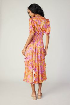 Done in a grand floral print, this midi dress is perfect for sun-drenched strolls through the countryside or your favorite city park. It has daintily detailed ruffles on the shoulders and skirt, plus its got slightly structured shoulders for a defined shape. •Split neckline •Relaxed fit •Lightly ruffled shoulders •Ruffled skirt DIMENSIONS •Standard: 49" Length Item number 249007650% Polyester 50% Recycled Polyester Hand wash cold Digitally printed Digital Printing minimizes water consumption and Vacation Floral Print Midi Dress, Feminine Ruffled Midi Dress For Garden Party, Vacation Midi Dress With Floral Print, Floral Print Knee-length Midi Dress For Day Out, Flowy Chiffon Midi Dress With Ruffles, Ruched Midi Dress For Spring And Summer, Ruched Midi Dress For Warm Weather, Summer Floral Print Mid-length Midi Dress, Garden Party Midi Maxi Dress With Ruffled Skirt