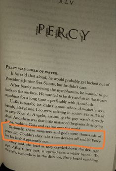 an open book with the words percy on it and a red arrow pointing up