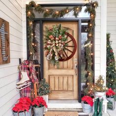 the front door is decorated with christmas decorations