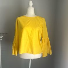 Yellow Blouse Never Worn. In Great Condition Chic Stretch Shirt For Spring, Spring Cotton Blouse With Bell Sleeves, Spring Cotton Bell Sleeve Blouse, Spring Stretch Blouse, Spring Bell Sleeve Cotton Blouse, Fitted Bell Sleeve Cotton Tops, Solid Color Blouse For Spring Brunch, Chic Bell Sleeve Tops For Spring, Chic Bell Sleeve Tops For Summer