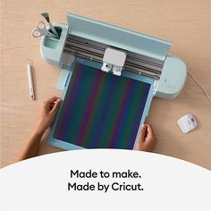 an overhead view of a person using a machine to cut paper with the words made by cricut for circuit machines