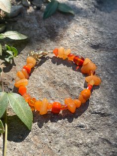 Bright and beautiful orange beaded bracelet with semiprecious gemstone, glass and crystal beads. Luxury Orange Gemstone Beads Jewelry, Cheap Orange Beaded Bracelets For Beach, Spiritual Orange Beaded Bracelets As Gift, Orange Bohemian Beaded Bracelets With Faceted Beads, Orange Spiritual Beaded Bracelets, Handmade Orange Agate Bracelets, Bohemian Orange Hand-strung Bracelets, Handmade Orange Agate Bracelet, Bohemian Orange Hand-strung Bracelet