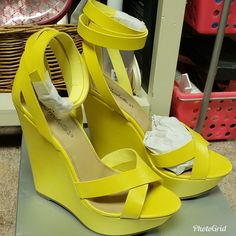 Wrap Ankle Wedge With Platform Synthetic Manmade Sole Platform Measures Approximately 1.75" Synthetic Upper, Synthetic Sole Measurements Approx: Heel 5.75" W/ 1.75" Platform Non-Skid Sole And Cushioned Footbed. Fit: Runs True To Size. Yellow Wedge Heels, Yellow Closed Toe Synthetic Wedge Sandals, Yellow Synthetic Wedge Sandals With Ankle Strap, Yellow Synthetic Closed Toe Wedge Sandals, Yellow Synthetic Ankle Strap Wedge Sandals, Yellow Synthetic Sandals With 4-inch Heel, Yellow Synthetic Wedge Heel Sandals, Yellow Wedge Heels With Heel Strap, Yellow Synthetic Heels With Heel Loop